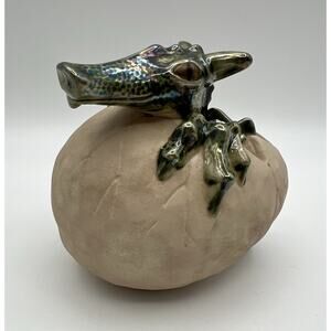 The Potting Shed Art Pottery Iridescent Green Dinosaur in Hatching Egg 5” Signed
